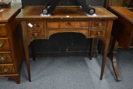 A 19th century mahogany side table or low boy.