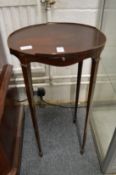 A George III style mahogany urn stand.