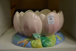 A Clarice Cliff crocus shaped planter and a Sylvac planter.