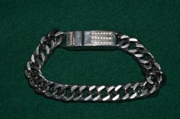 A metal identity bracelet.