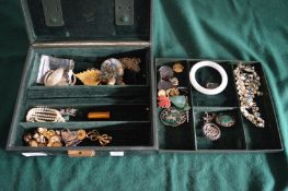 A jewellery box and contents.