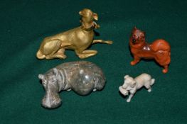 An ormolu mount modelled as a dog and three other items.