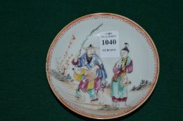 A Chinese famille rose saucer.