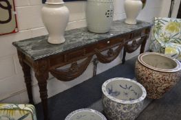 A good carved hardwood and marble top serving table of classical design.