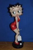 A Betty Boop figure.