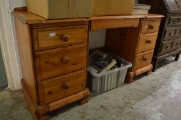 A modern pine pedestal dressing table or desk.