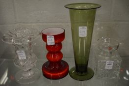 Four mid-century glass vases.