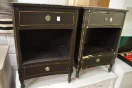 A pair of concave fronted two drawer bedside chests (paint loss).