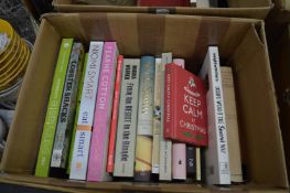 Three boxes of assorted books.