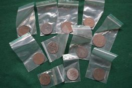 A bag of ten copper coins and tokens.