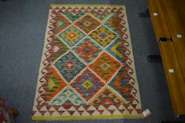 A good small colourful Kilim rug, 124cm x 84cm.