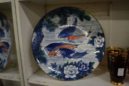 Japanese porcelain charger depicting carp.