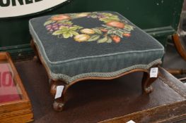 A small Victorian needlework upholstered stool.
