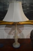 A good carved alabaster table lamp.