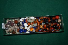A box of decorative bead necklaces.