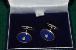 A pair of stylish cufflinks.