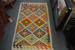 A good small colourful Kilim rug, 132cm x 74cm.