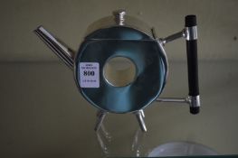 A Christopher Dresser style teapot.