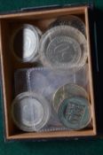 Box of various coins.