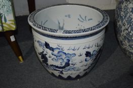 A Chinese blue and white fish bowl.