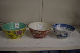 Three Chinese bowls.