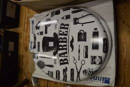 A novelty barbers toilet seat.