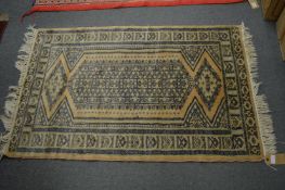 A small Persian style rug, 125cm x 81cm.