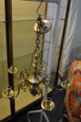 A brass Dutch style five branch chandelier.