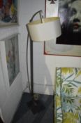 A Mama Ligne Roset floor standing lamp.