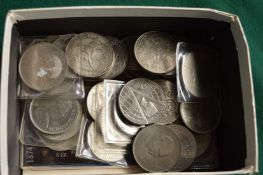 A box of fifty various crowns.