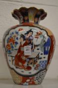 A Japanese enamel decorated vase.