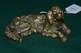 A cast brass dog inkwell.
