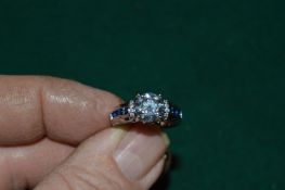 A decorative ring set with 3ct Moissanite, with certificate.