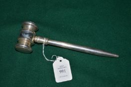 A plated gavel.