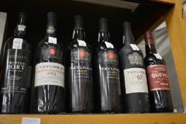 Six bottles of various port.