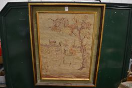 An embroidered picture.