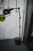 A Jielde adjustable floor standing lamp.
