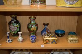 Oriental items to include cloisonne vases together with decorative lacquer boxes.