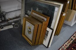 A group of decorative prints and a military photograph.