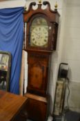 A 19th century mahogany longcase clock with eight day movement, the painted arched dial signed