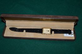 A gentlemans Fauvre-Leuba wristwatch with leather strap.