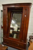A Victorian mahogany mirrored door wardrobe.