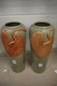 A pair of contemporary Oriental crackle glazed vases with leaf moulded decoration.