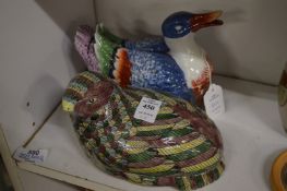 A Chinese pottery quail box and cover together with a similar mandarin duck box.