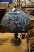A Tiffany style table lamp.