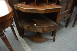 A mahogany corner washstand.