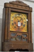 An oak mantel clock.