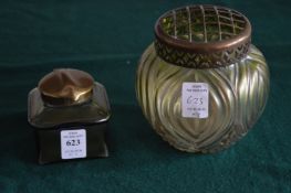 A Loetz style iridescent green glass inkwell with brass hinged cover together with a similar rose