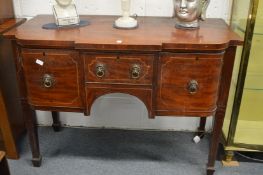A 19th century mahogany shaped front sideboard.