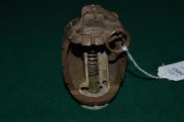 A Mills training hand grenade, with cut-away sections.